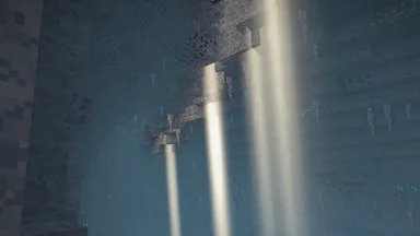 Shafts of warm daylight falling through the misty air of a great cavern, past hanging fangs.