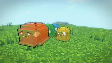 Elemental Gloops on a meadow: a fire Gloop in front, an earth, a water and a wind Gloop behind it.